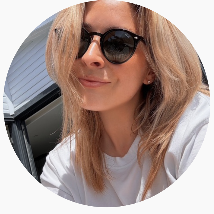 Lady with blonde hair is wearing sunglasses